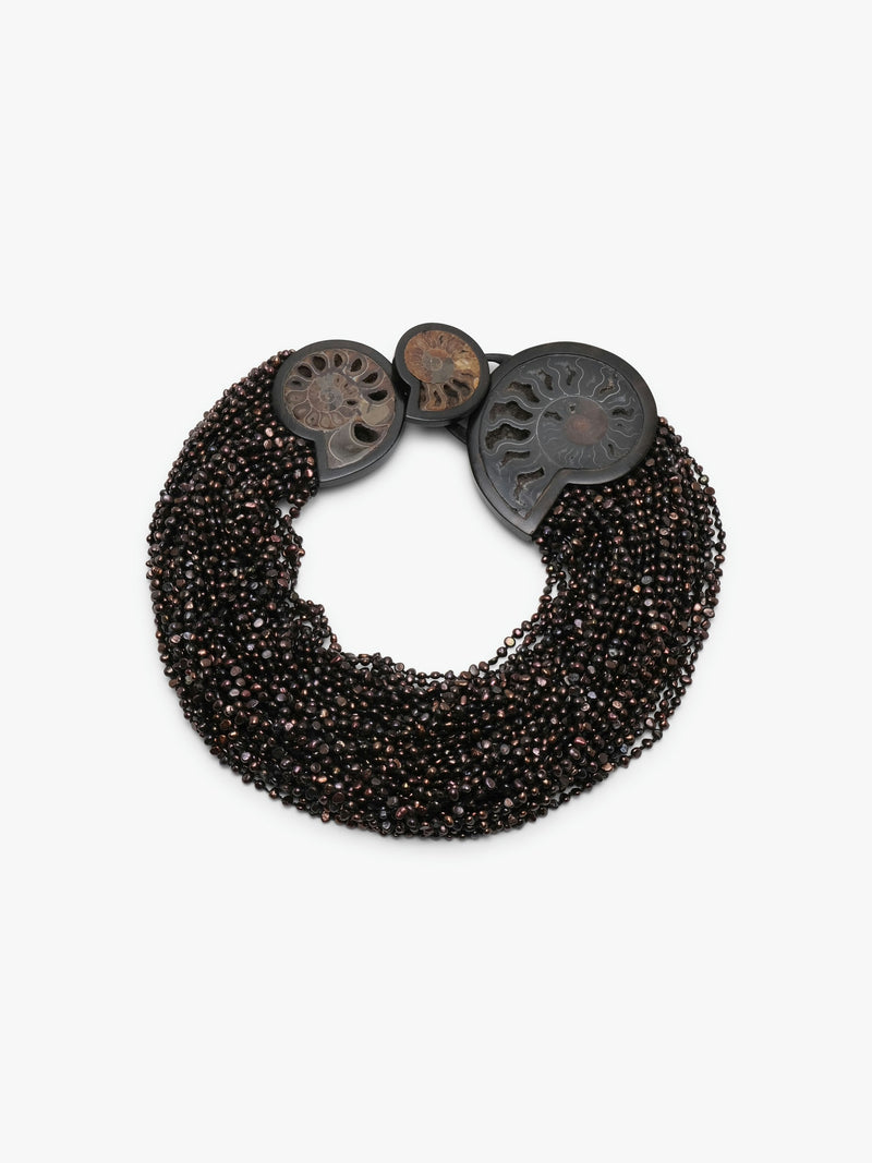 Necklace: amonite, ebony, pearls, leather
