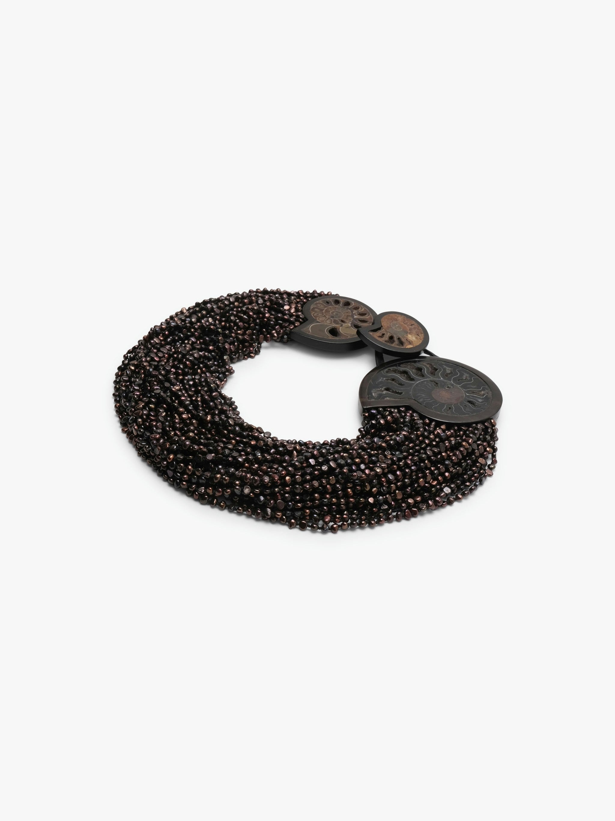 Necklace: amonite, ebony, pearls, leather