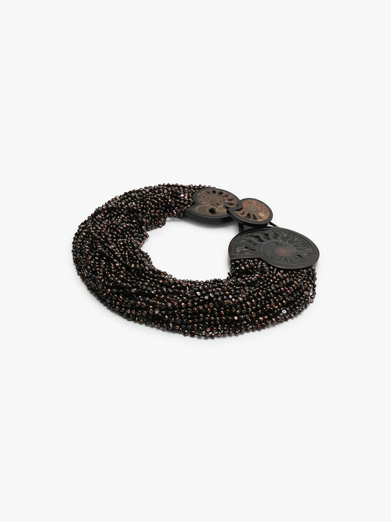 Necklace: amonite, ebony, pearls, leather