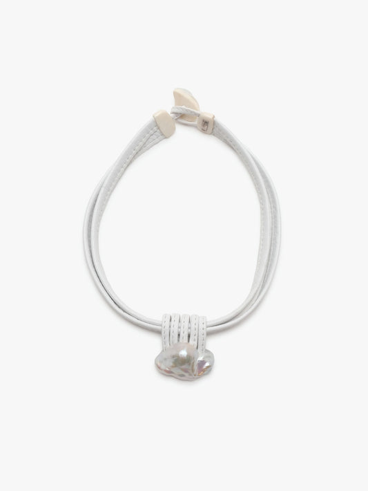 Necklace: baroque pearl, leather