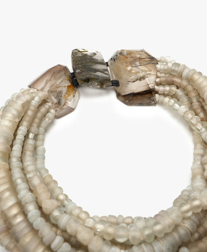 Necklace: antic glass beads, ruthilated quartz