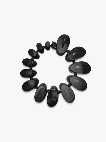 Necklace: horn, leather