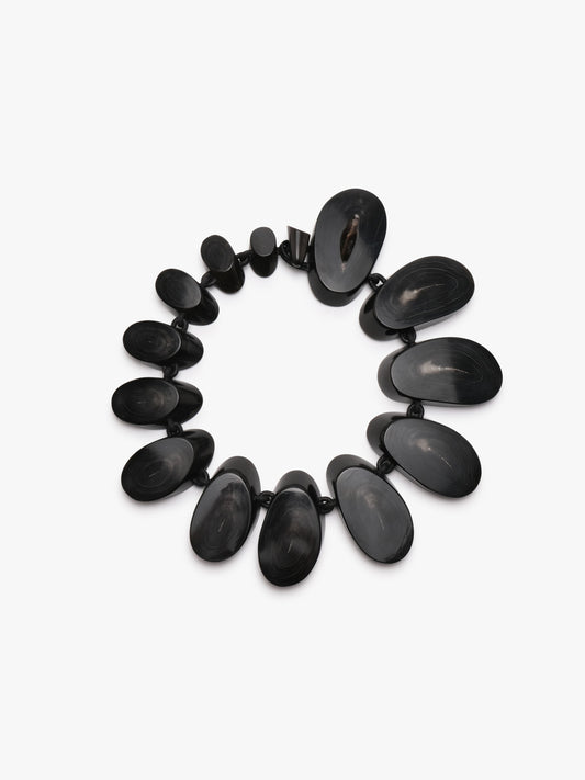Necklace: horn, leather