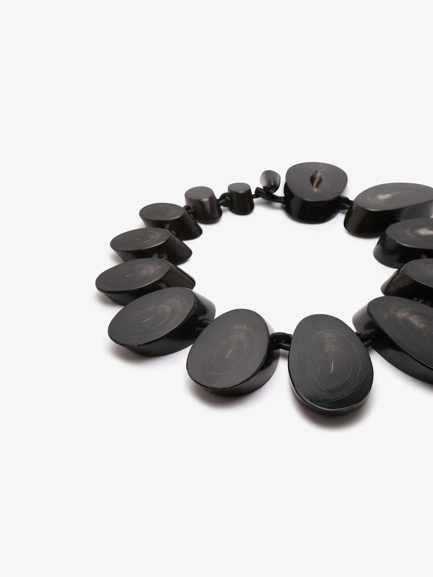 Necklace: horn, leather