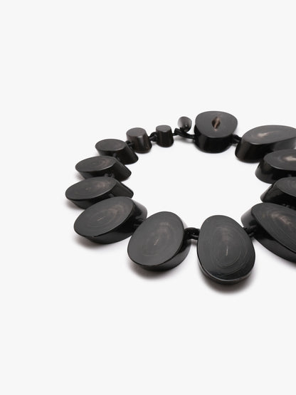 Necklace: horn, leather