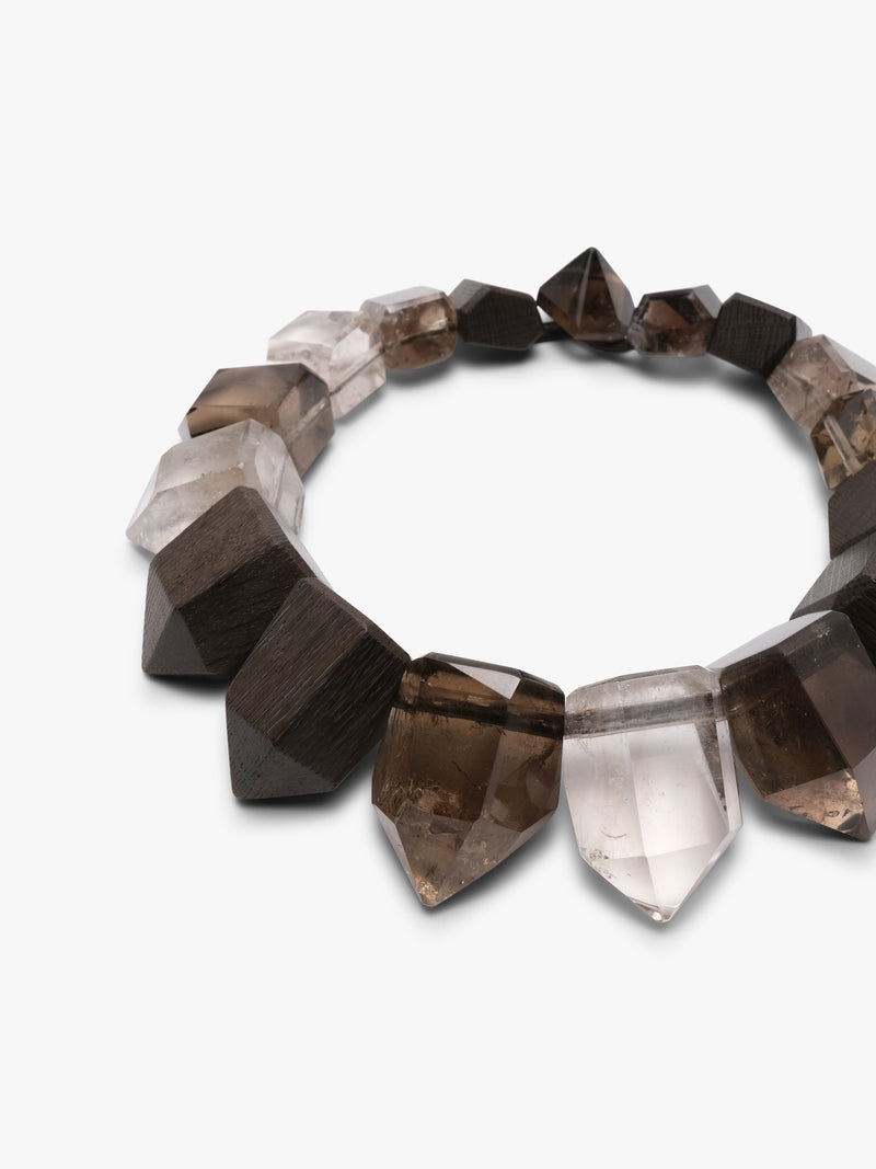 Necklace with faceted gemstones on a white background