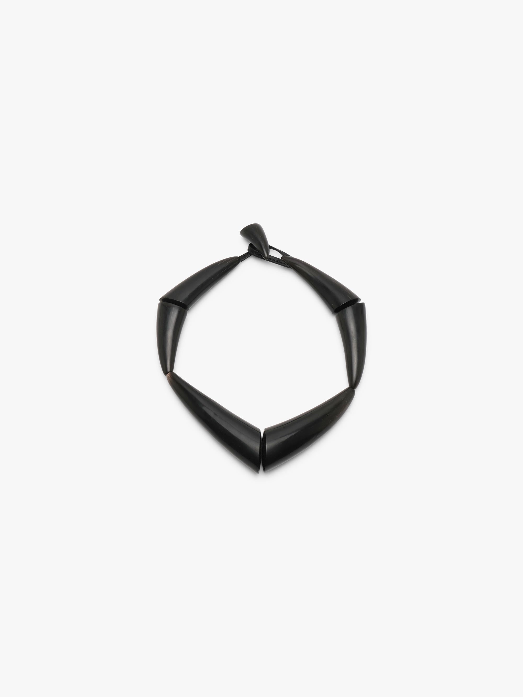 black necklace on a white background