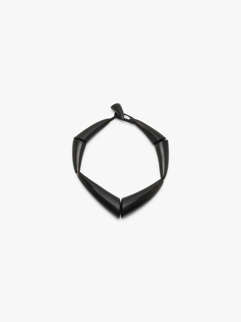 black necklace on a white background