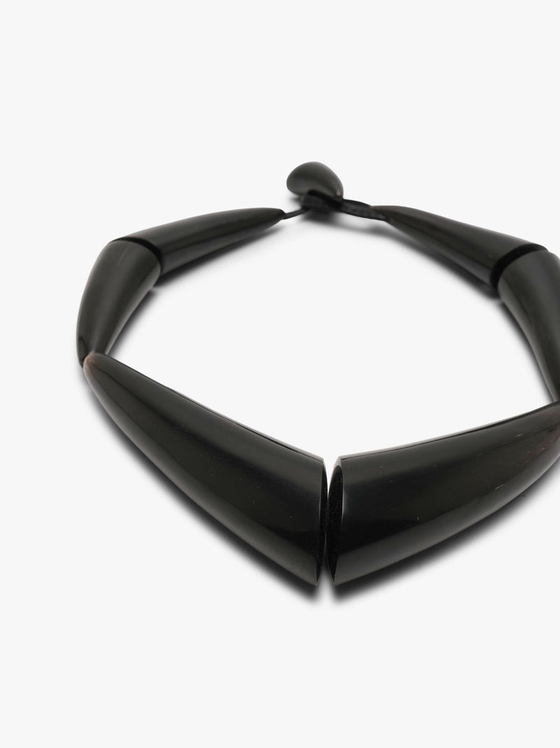 black necklace on a white background