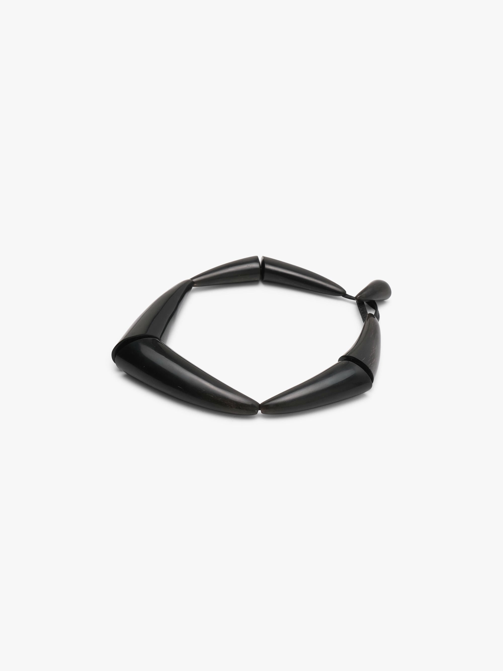 black necklace on a white background