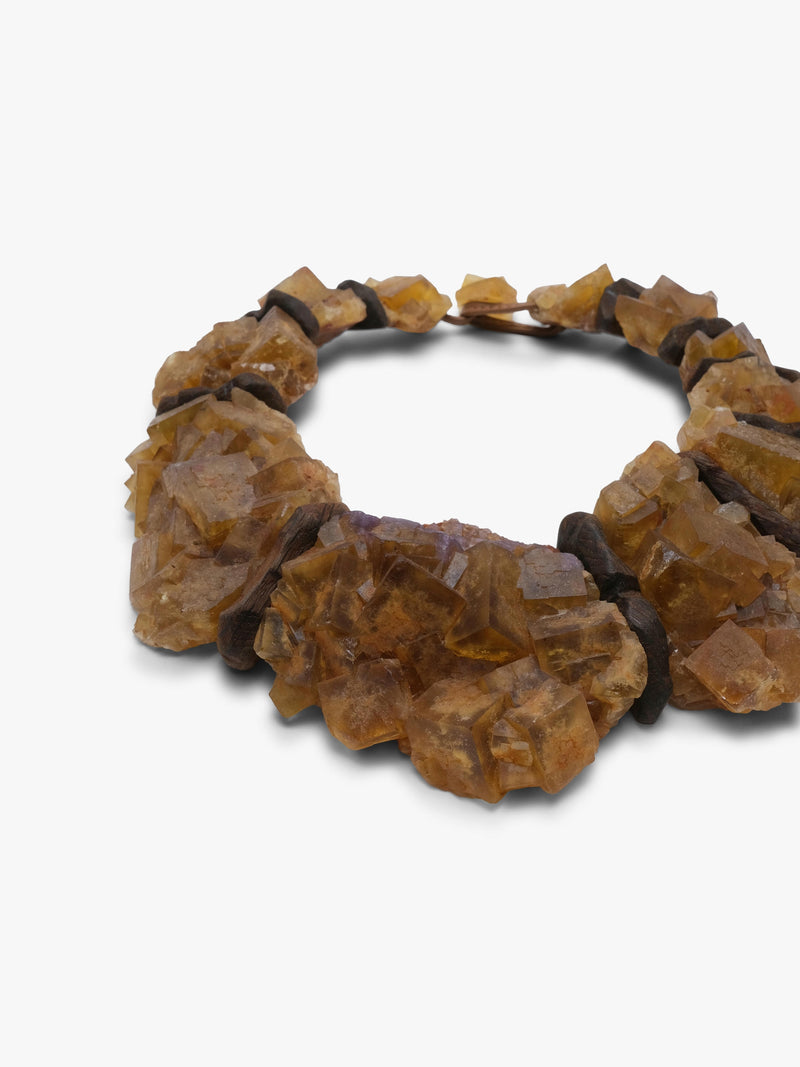 flourite and bog oak necklace on a white background