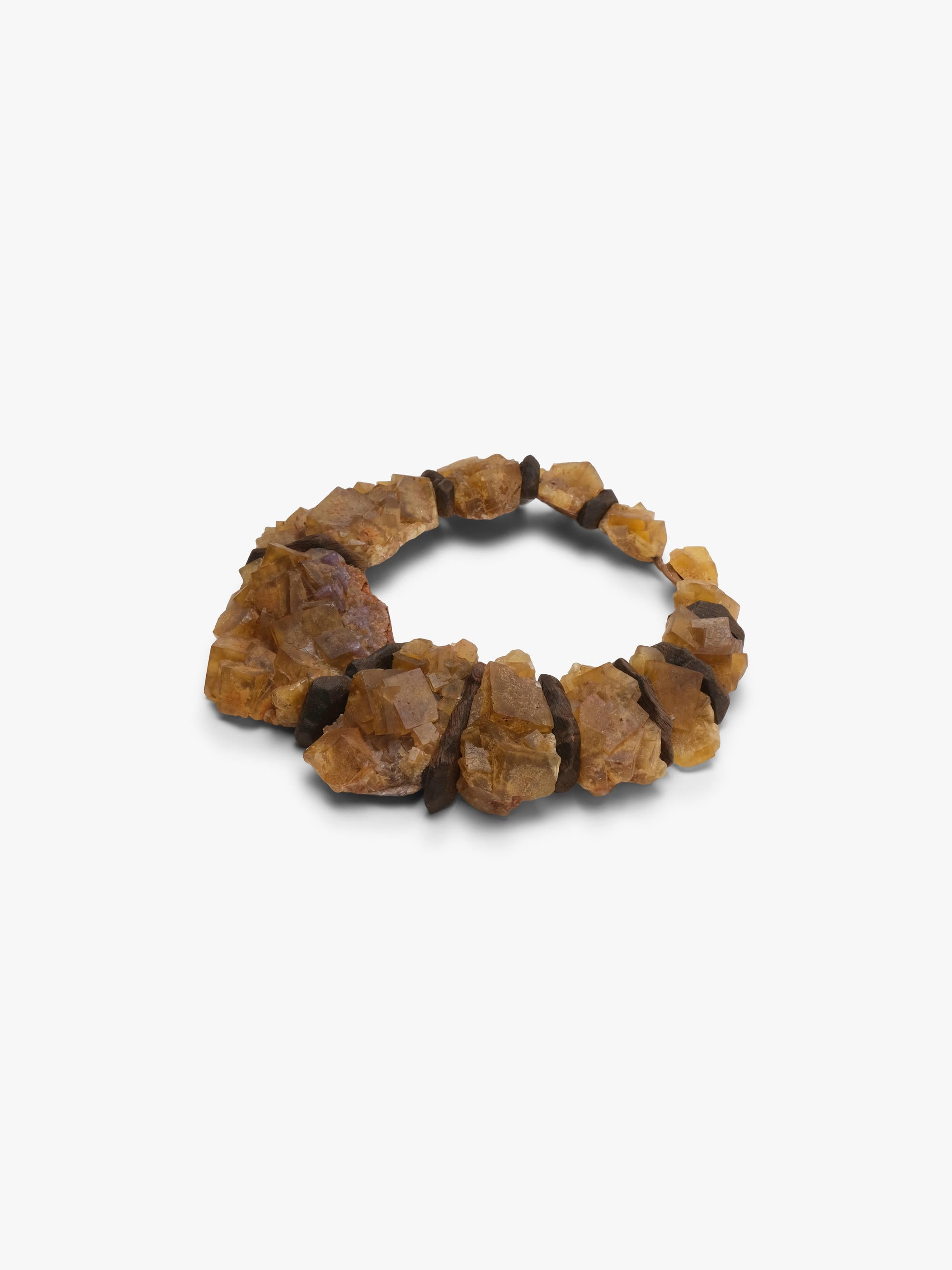 flourite and bog oak necklace on a white background