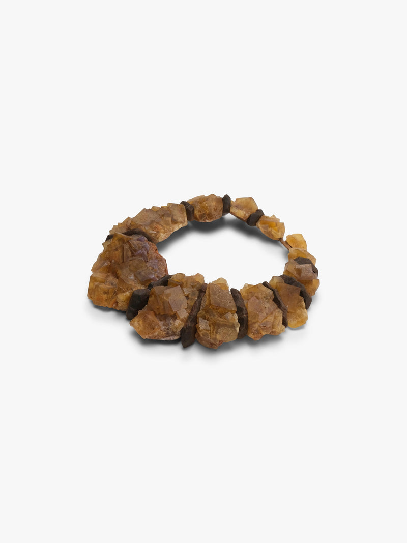 flourite and bog oak necklace on a white background