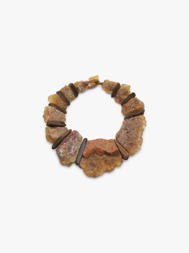 flourite and bog oak necklace on a white background