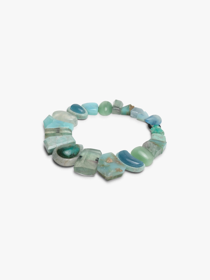 Turquoise beaded necklace on a white background