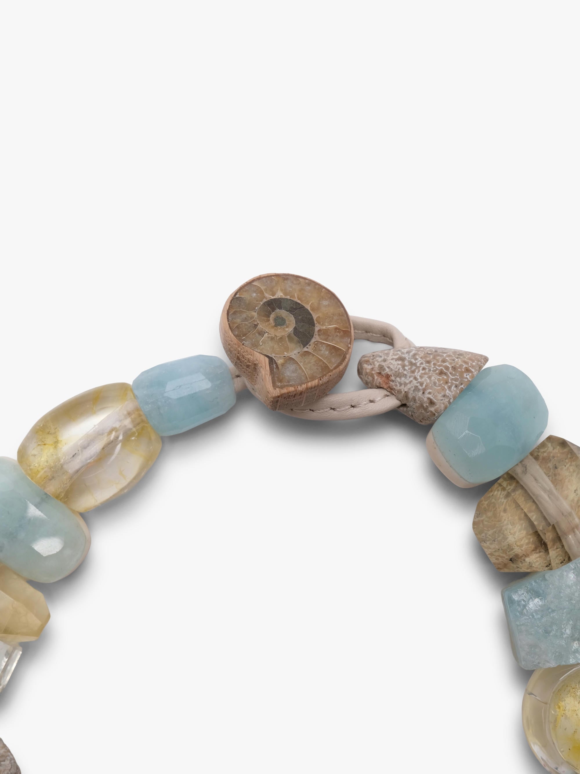 necklace with natural stone beads on a white background
