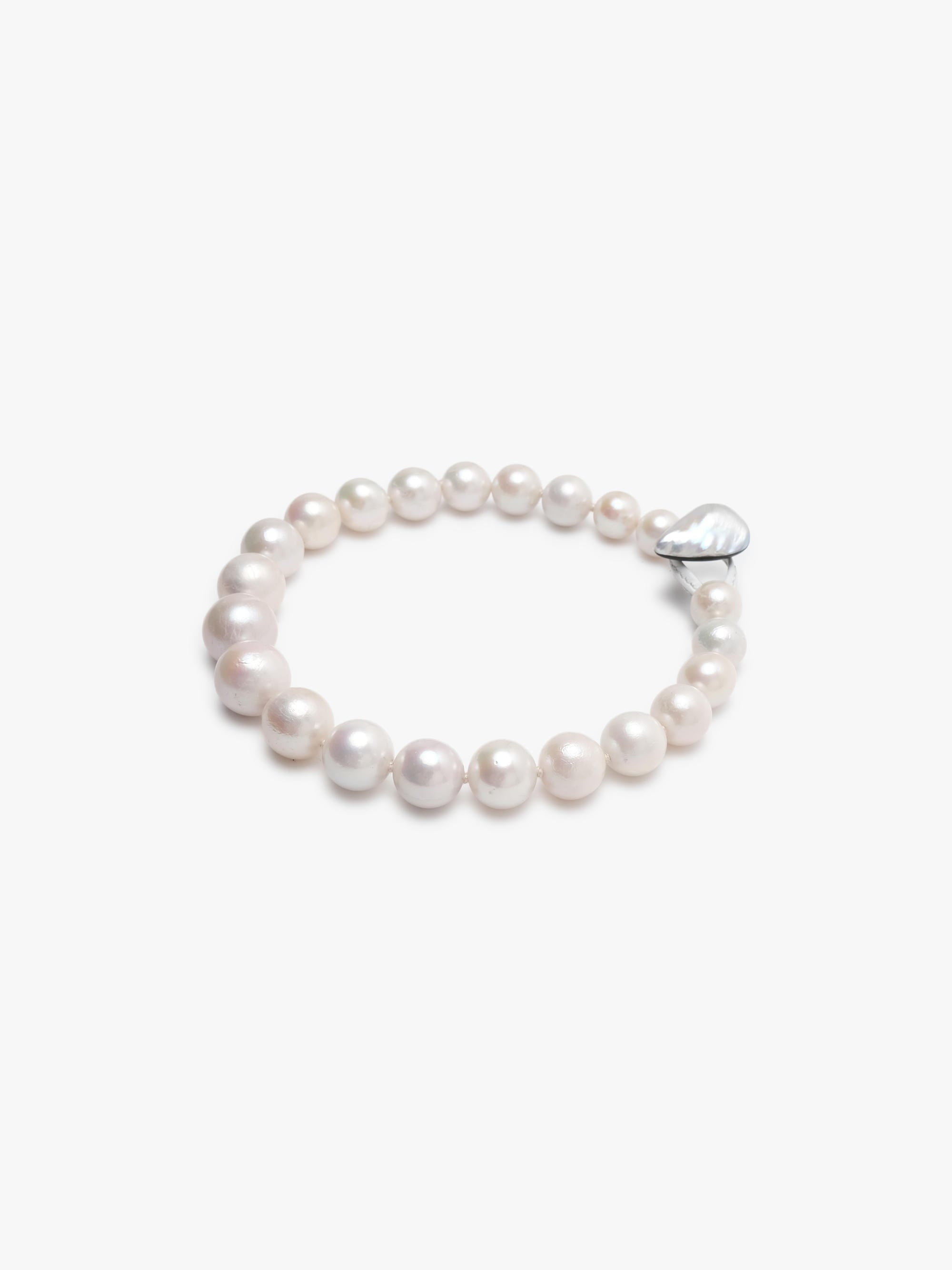 Pearl necklace on a white background