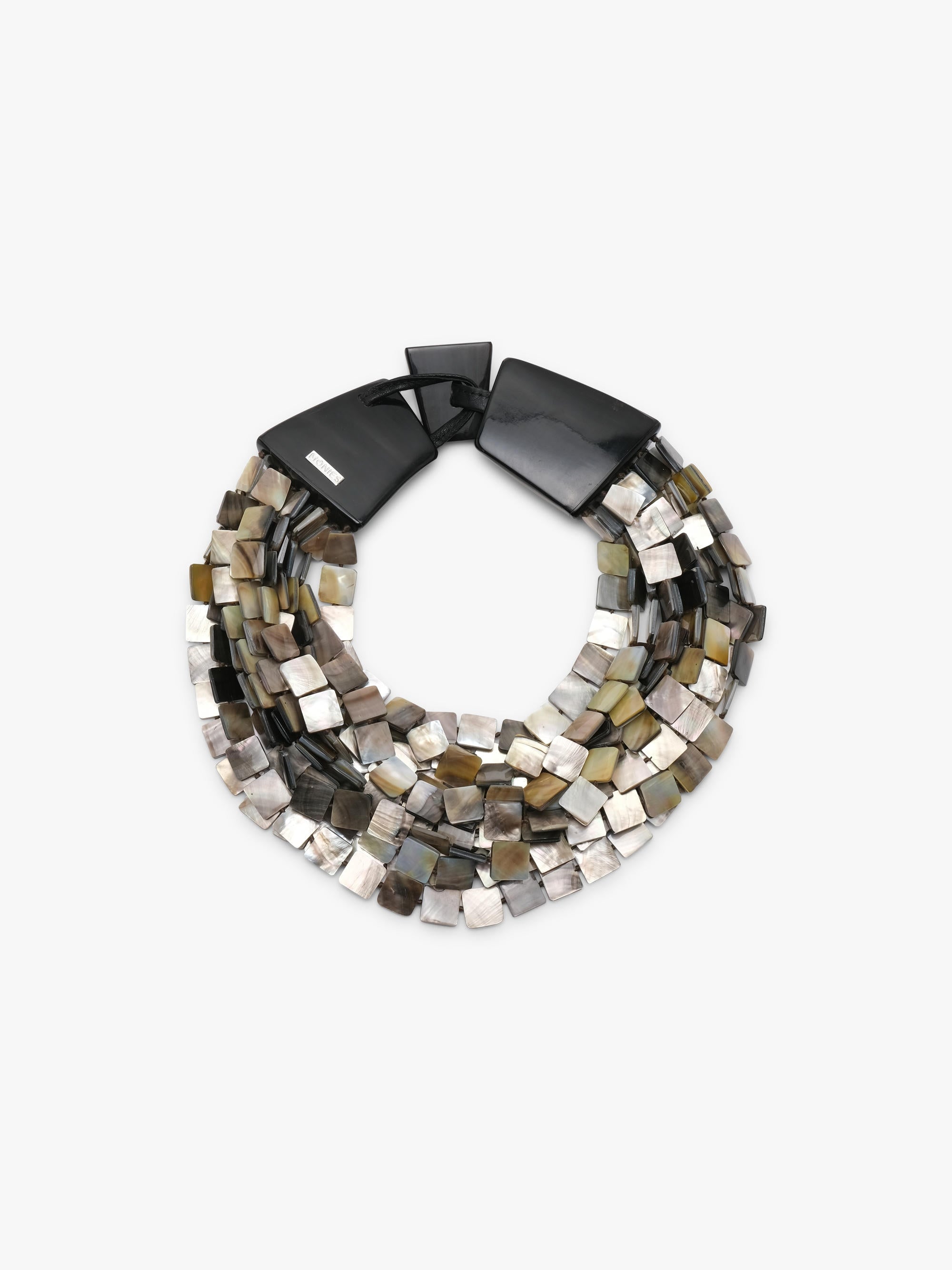 A multi-strand statement necklace featuring polished metallic square beads in silver, bronze, and gold tones, accented by two large dark brown shell-like end caps, shown on a plain light gray background.