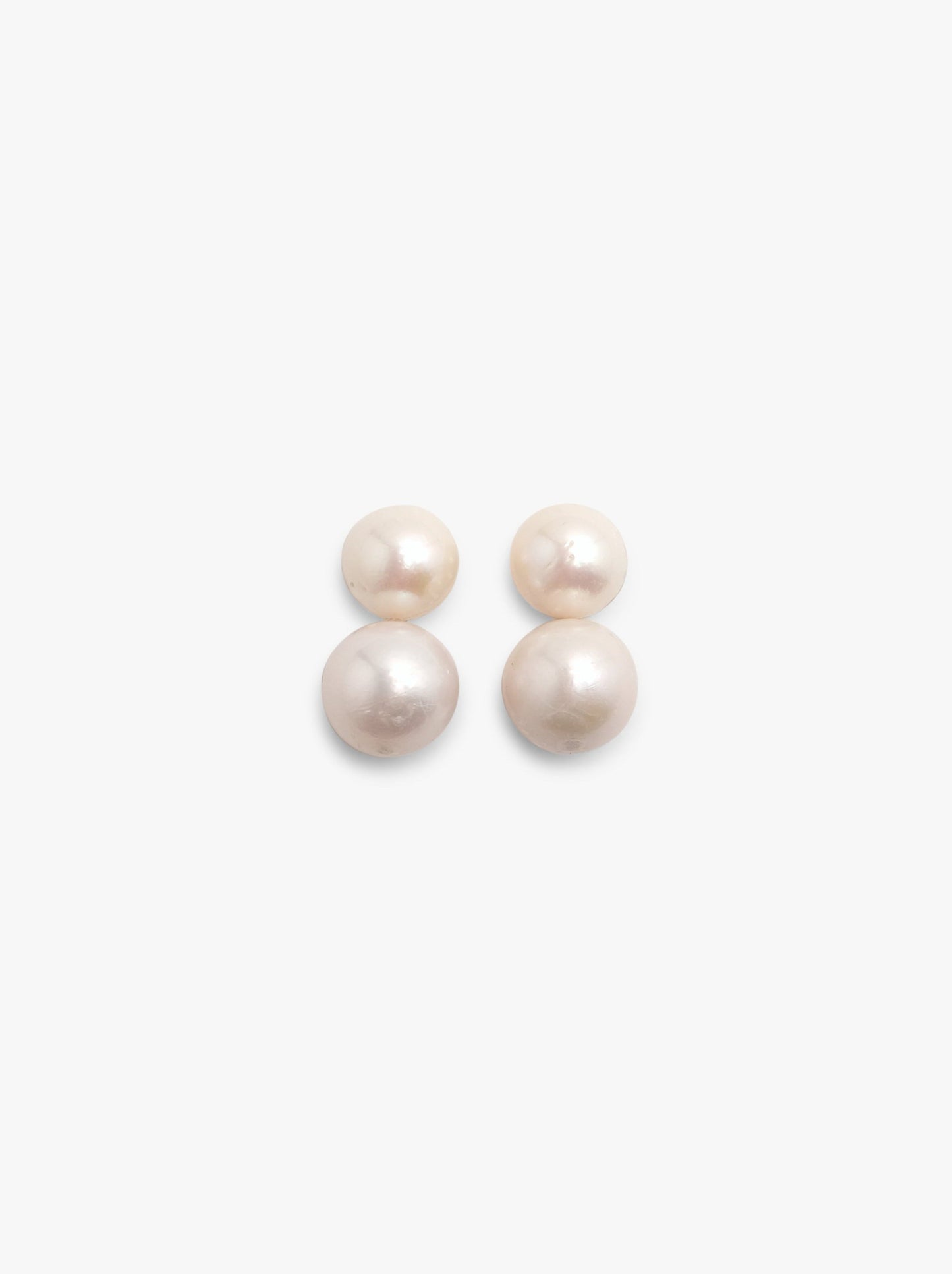 Stud earrings: pearls, horn