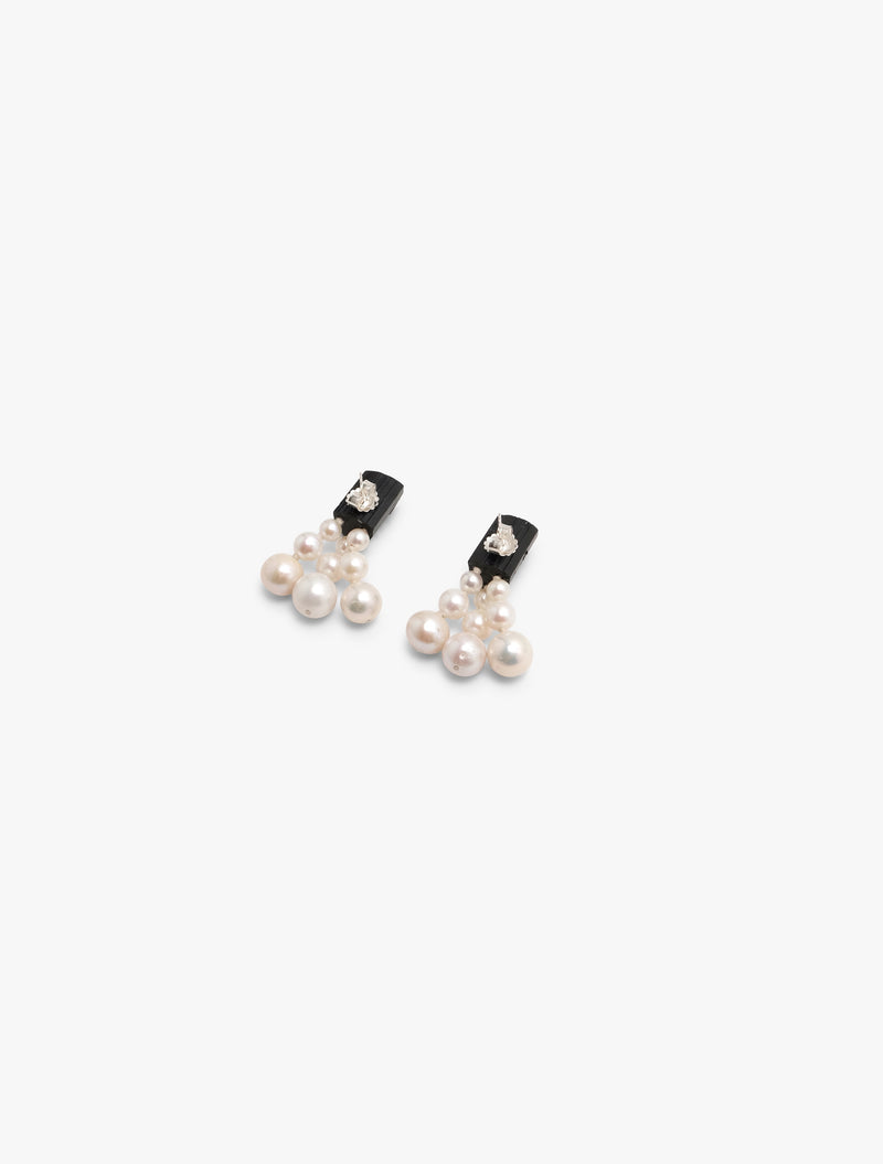 black earrings with a cluster of pearls underneath, displayed on a white background