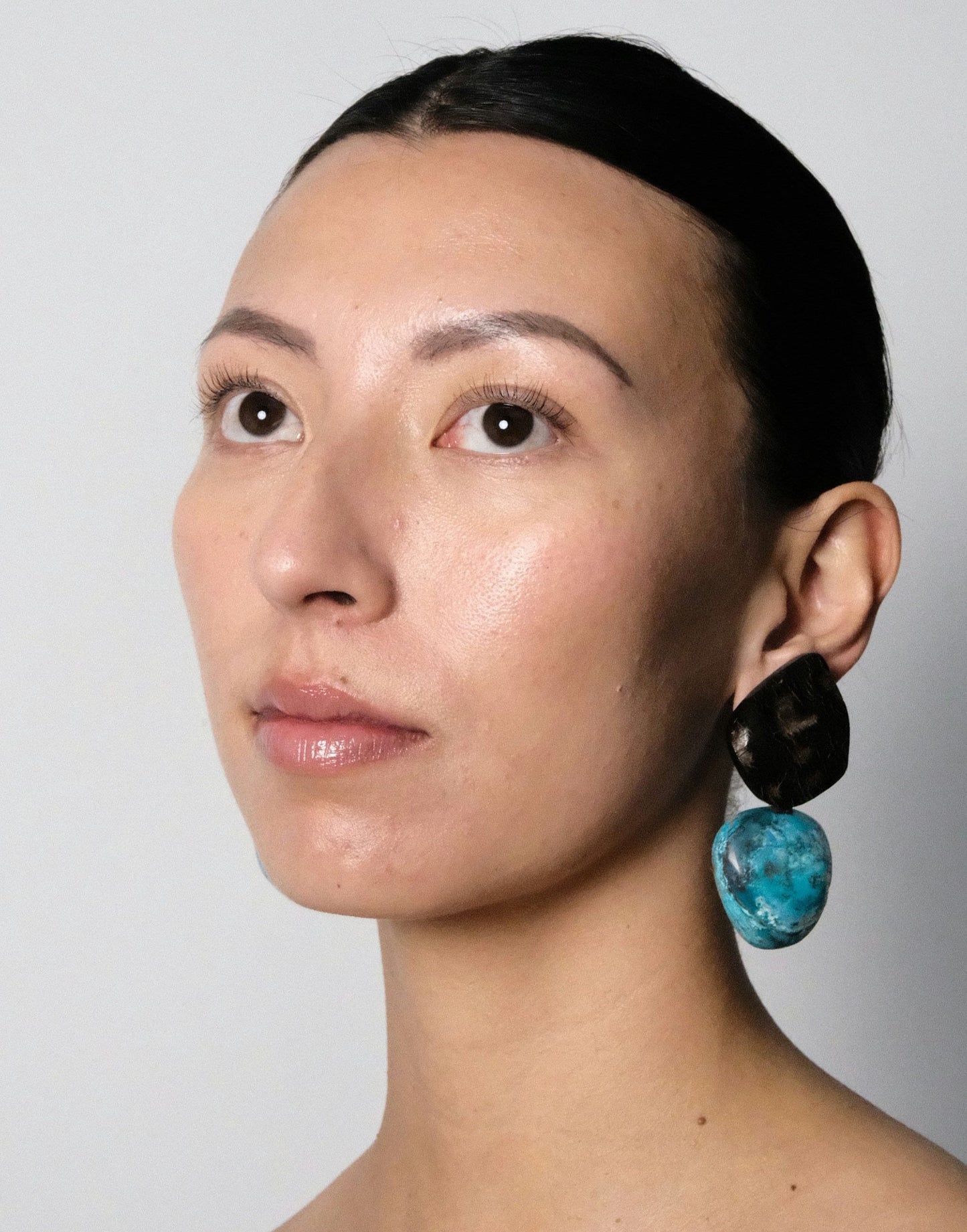 Earclips: horn, chrysocolla