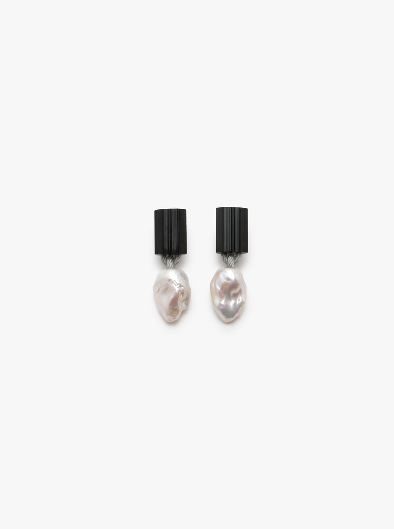 black earrings with baroque pearl extended beneath, displayed on a white background