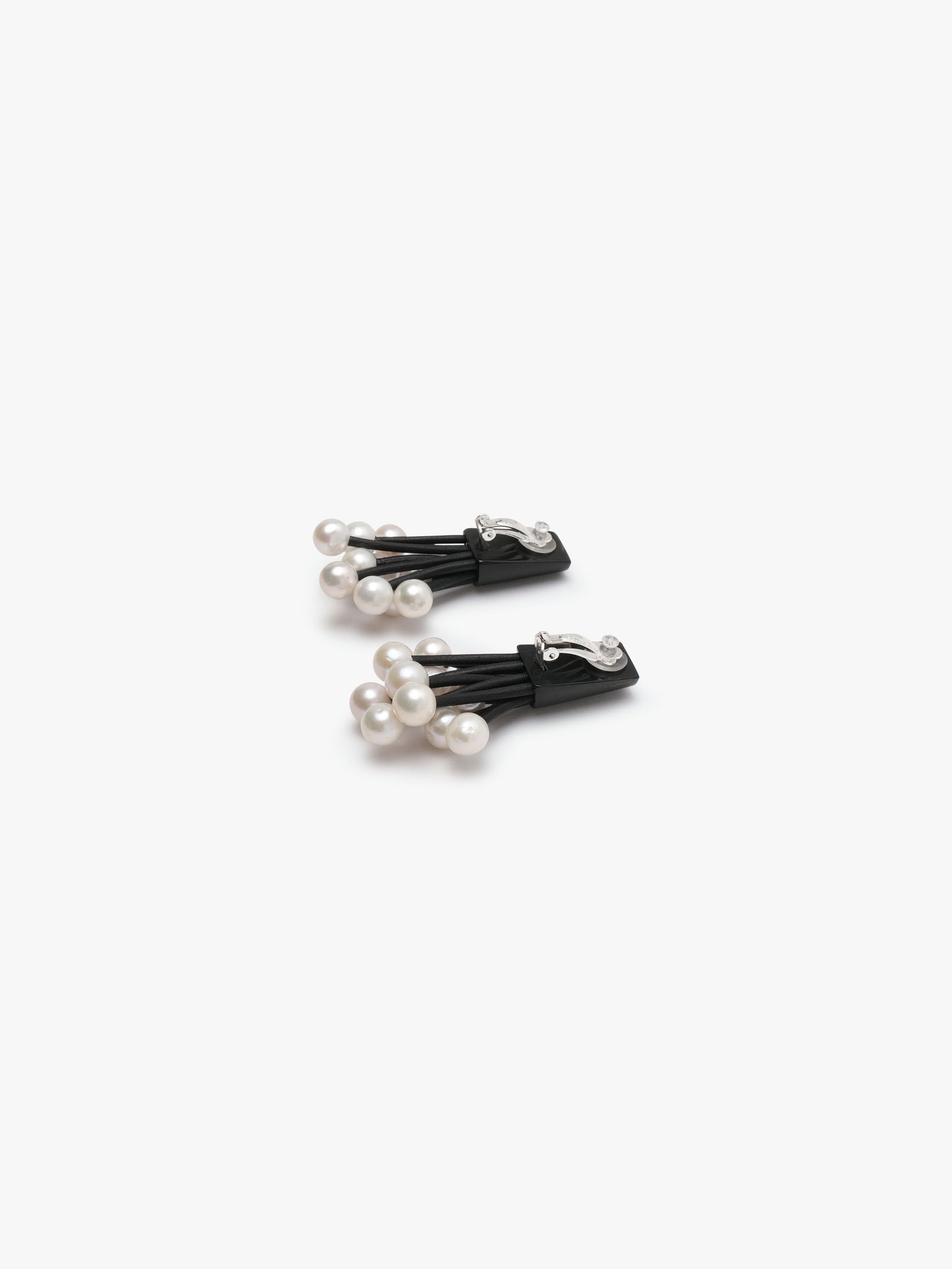 Earrings: horn, leather, freshwater pearl