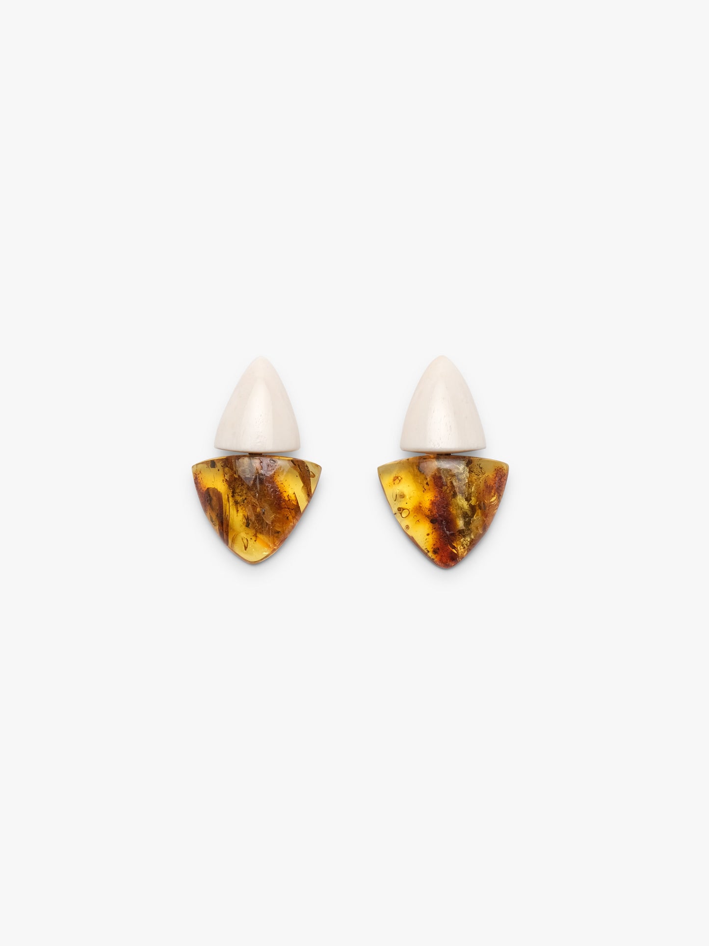 Earrings: bone, amber