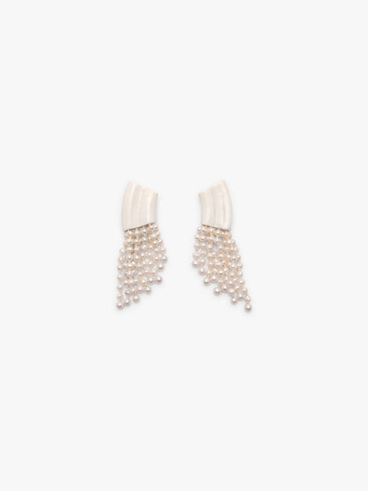 Earrings: freshwater pearls, warthog