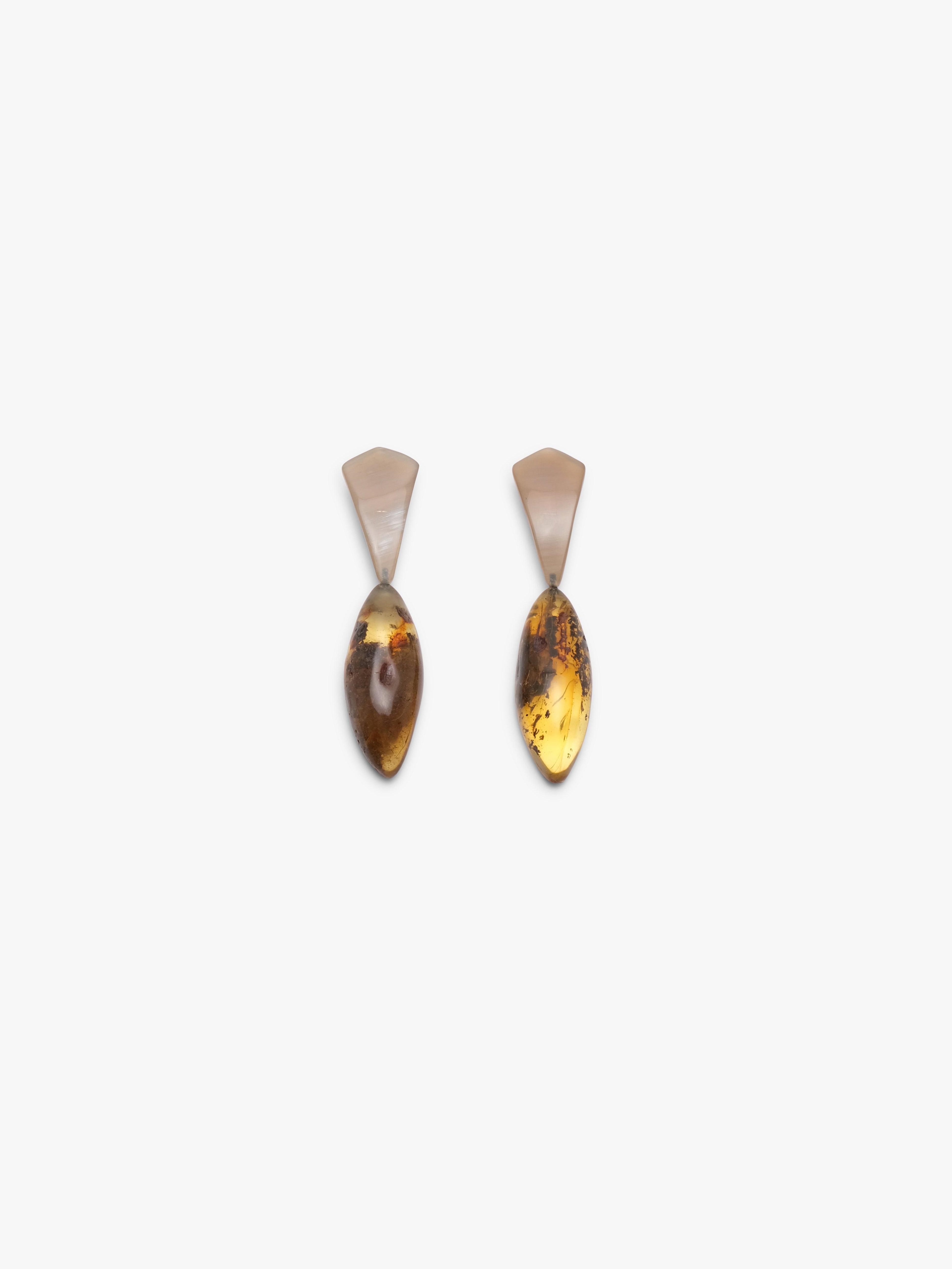 Earrings: horn, amber