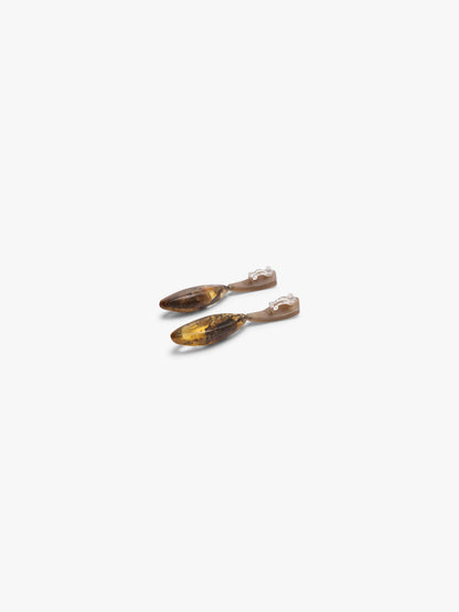 Earrings: horn, amber