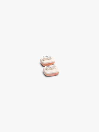 Earrings: carnelian, bone