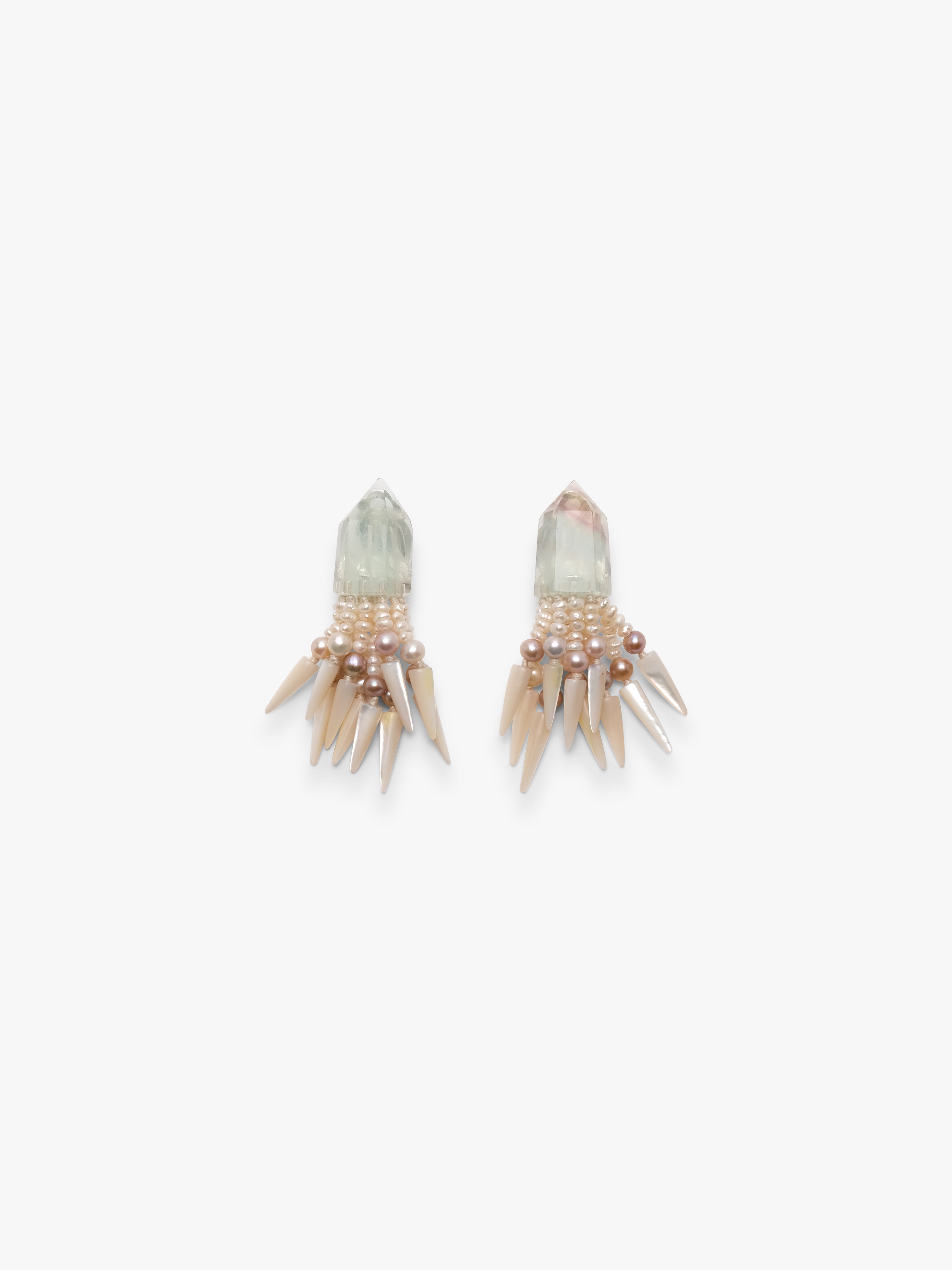 Pair of earrings made of flourite, mother of pearl, freshwater pearls on a white background