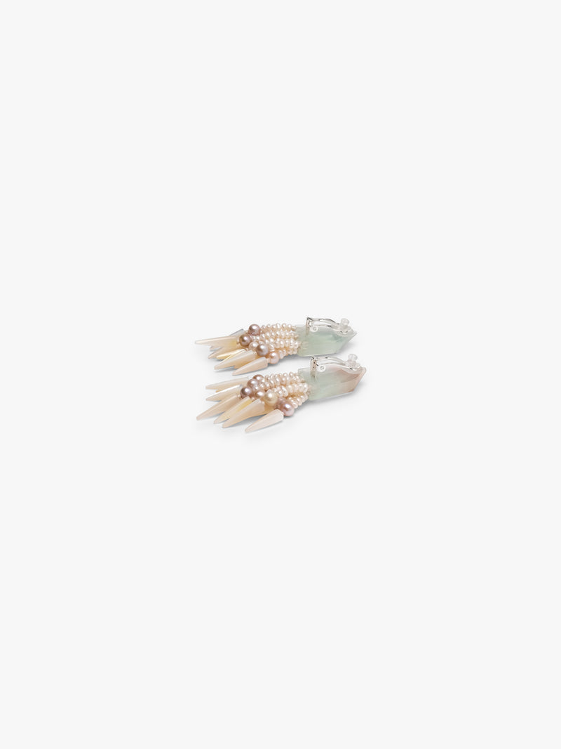 Pair of earrings with multiple strands on a white background