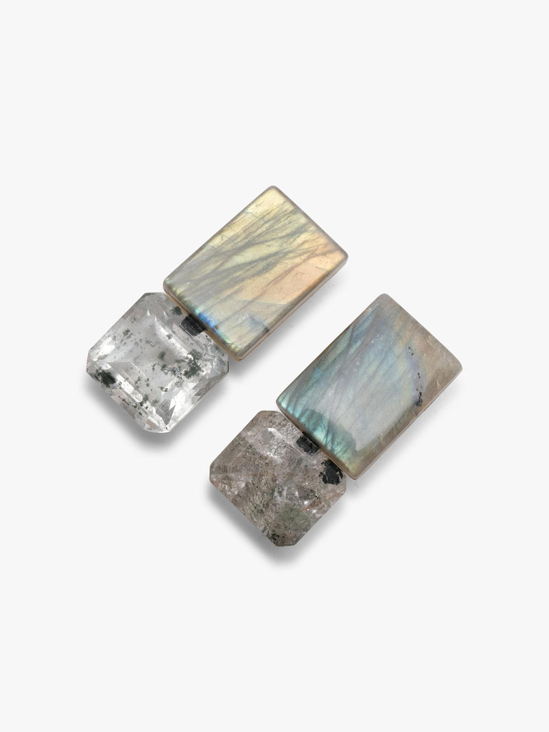 Pair of silver earrings made of quartz and labradroite on a white background
