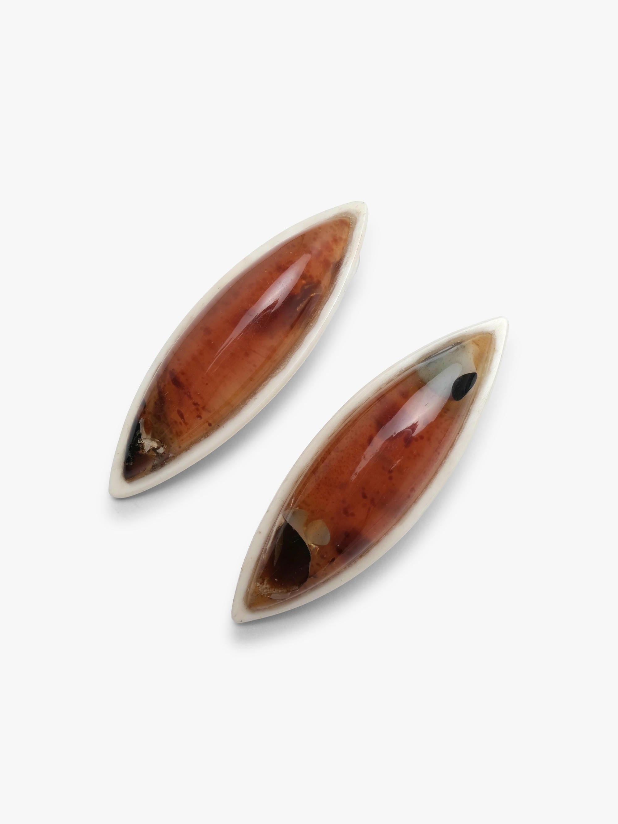 Earrings: amber, bone