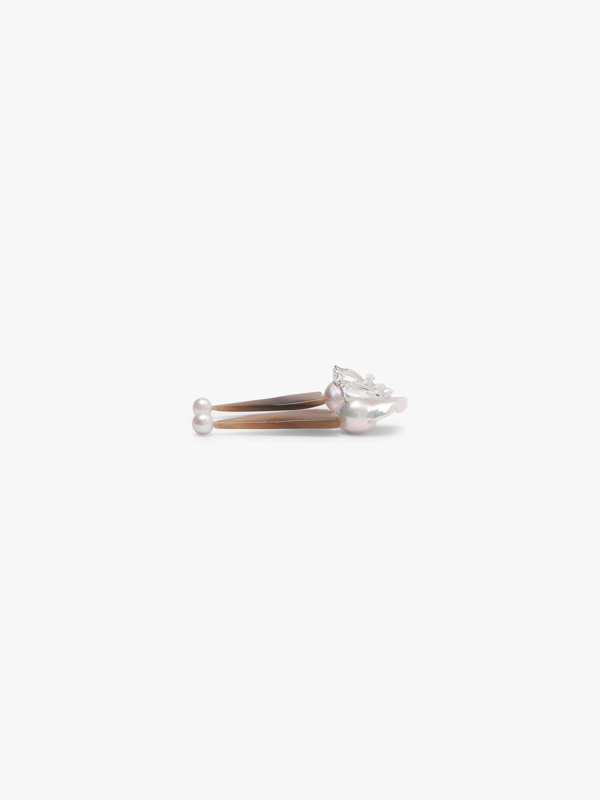 Earrings: baroque pearl, horn