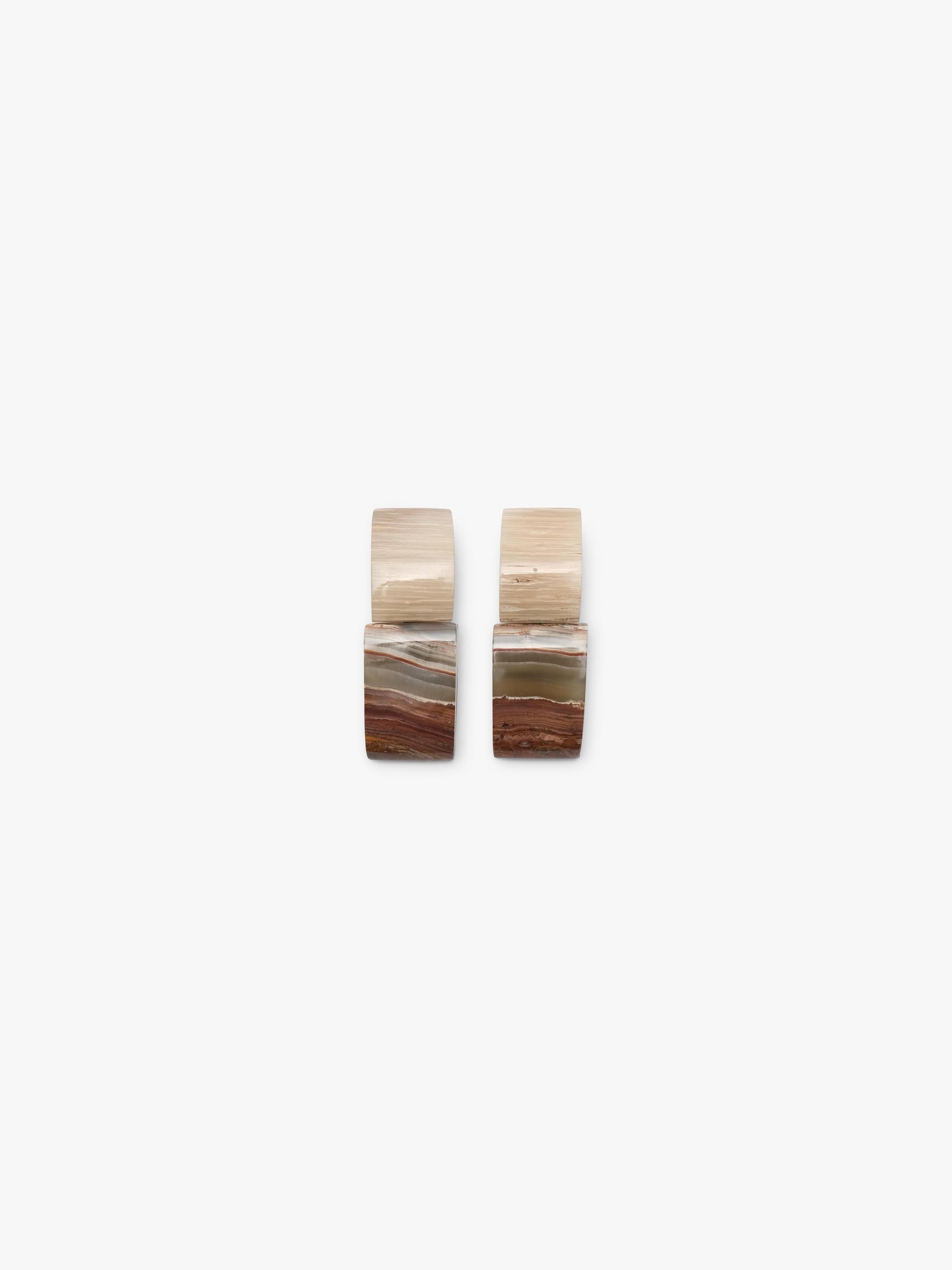 Earrings: onyx, musk ox bone, zebrano