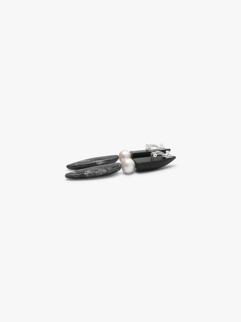 Earrings: horn, freshwater pearls, orthorecas