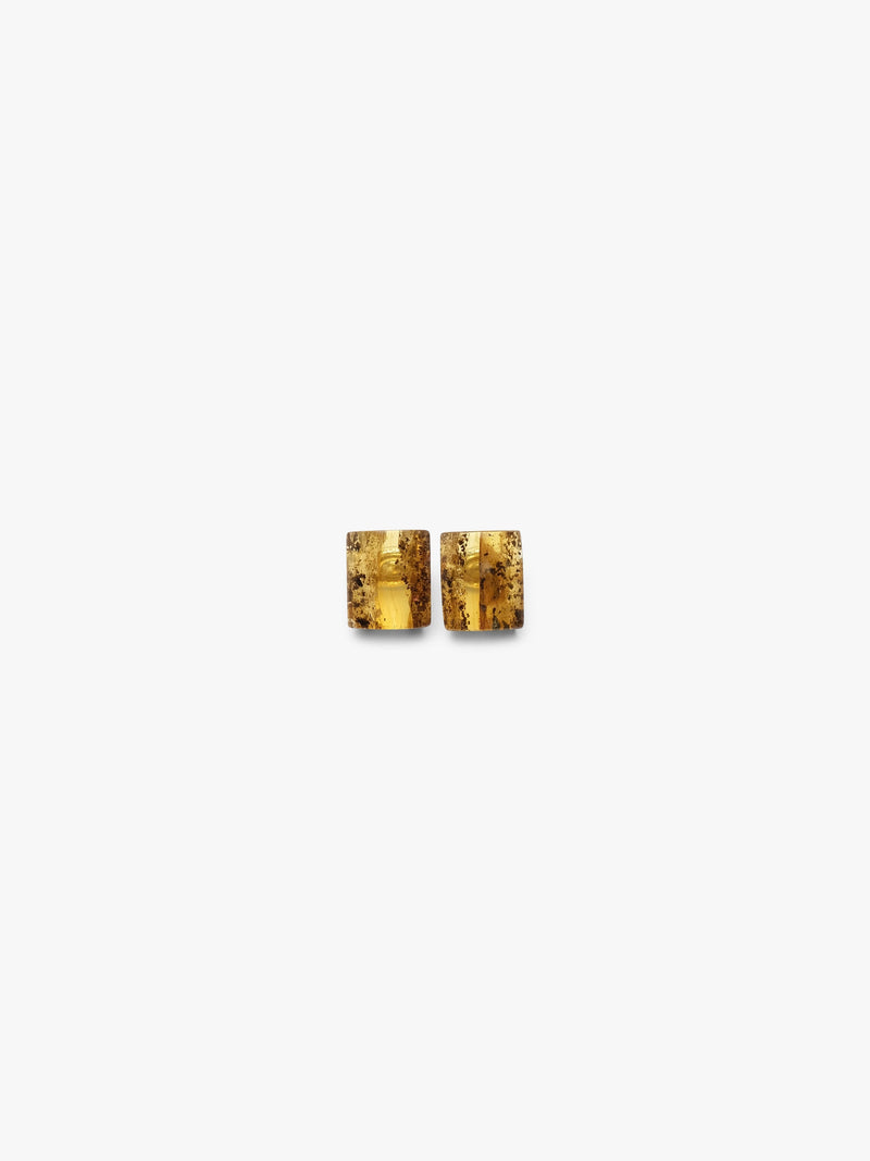 amber earrings on a white background