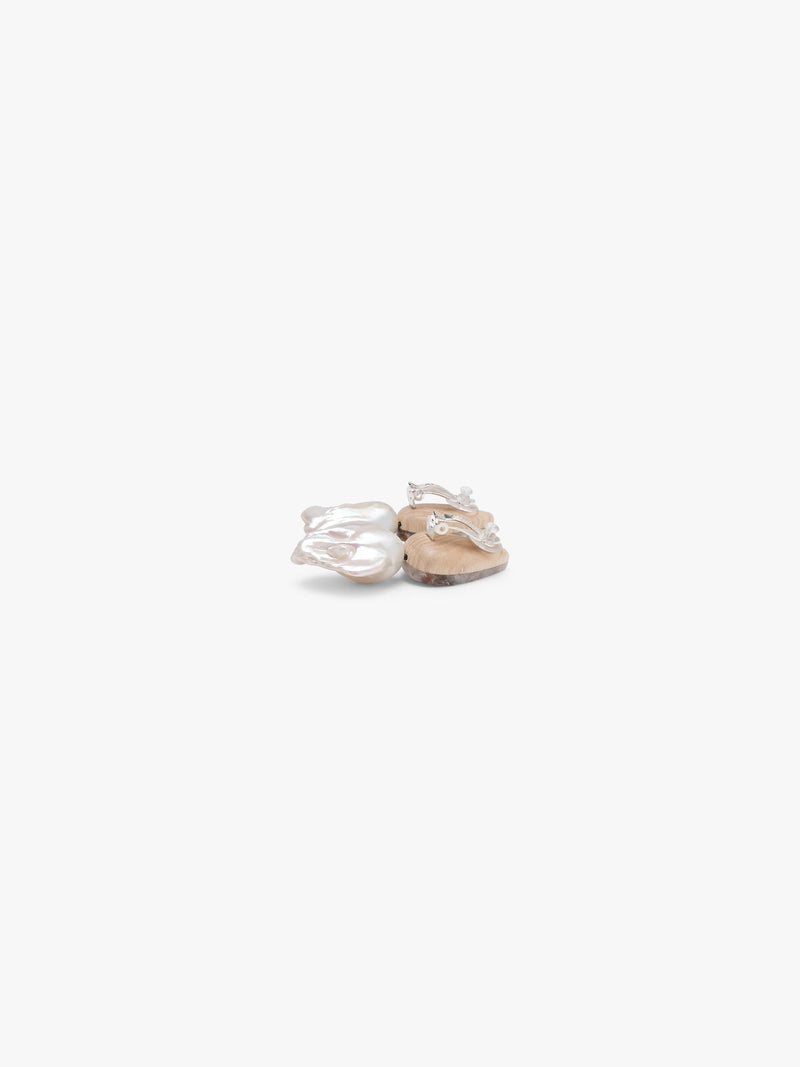 Pearl and chalcedony earrings on white background
