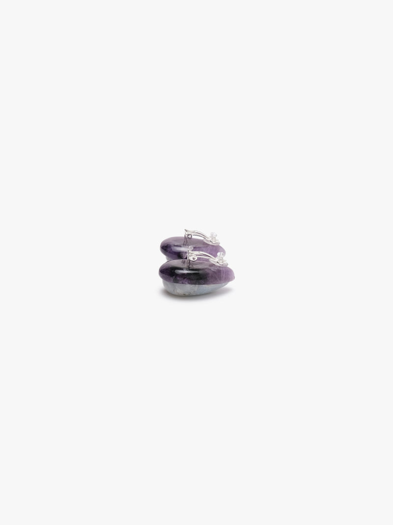 teardrop shaped earrings with blue, purple and brown hues on a white background