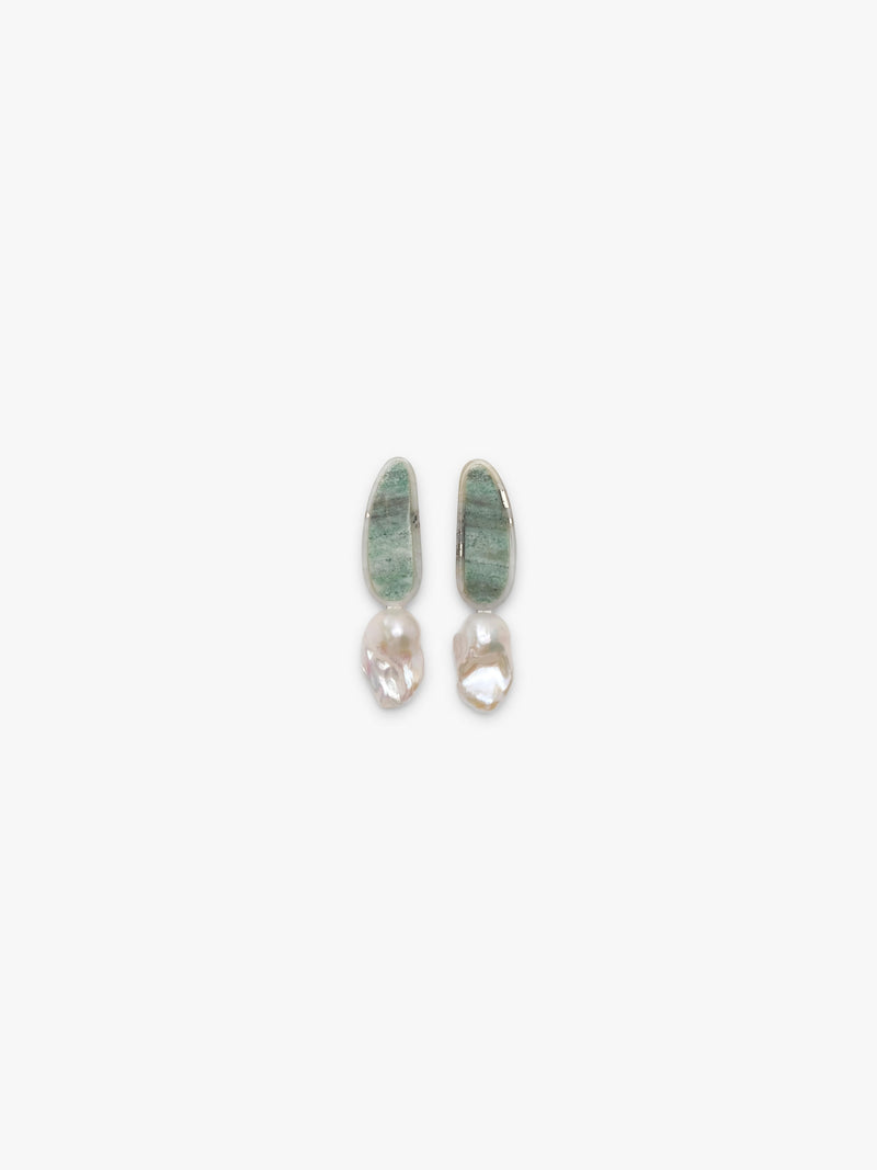 A pair of small drop earrings with green stone tops and baroque pearls, shown on a plain light gray background.