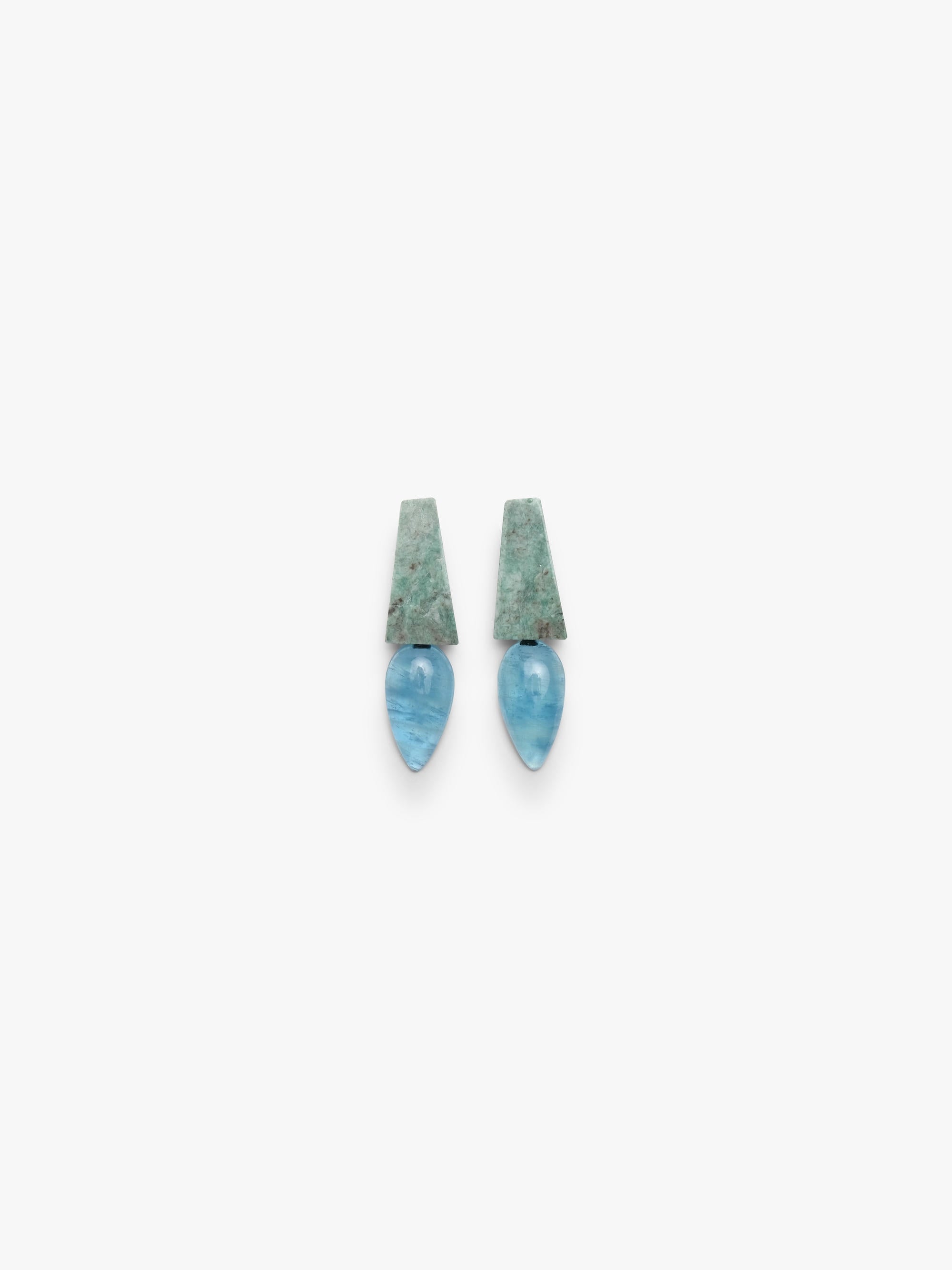A pair of drop earrings featuring textured, mossy green rectangular studs with smooth, teardrop-shaped light blue stone drops below, set against a plain off-white background.