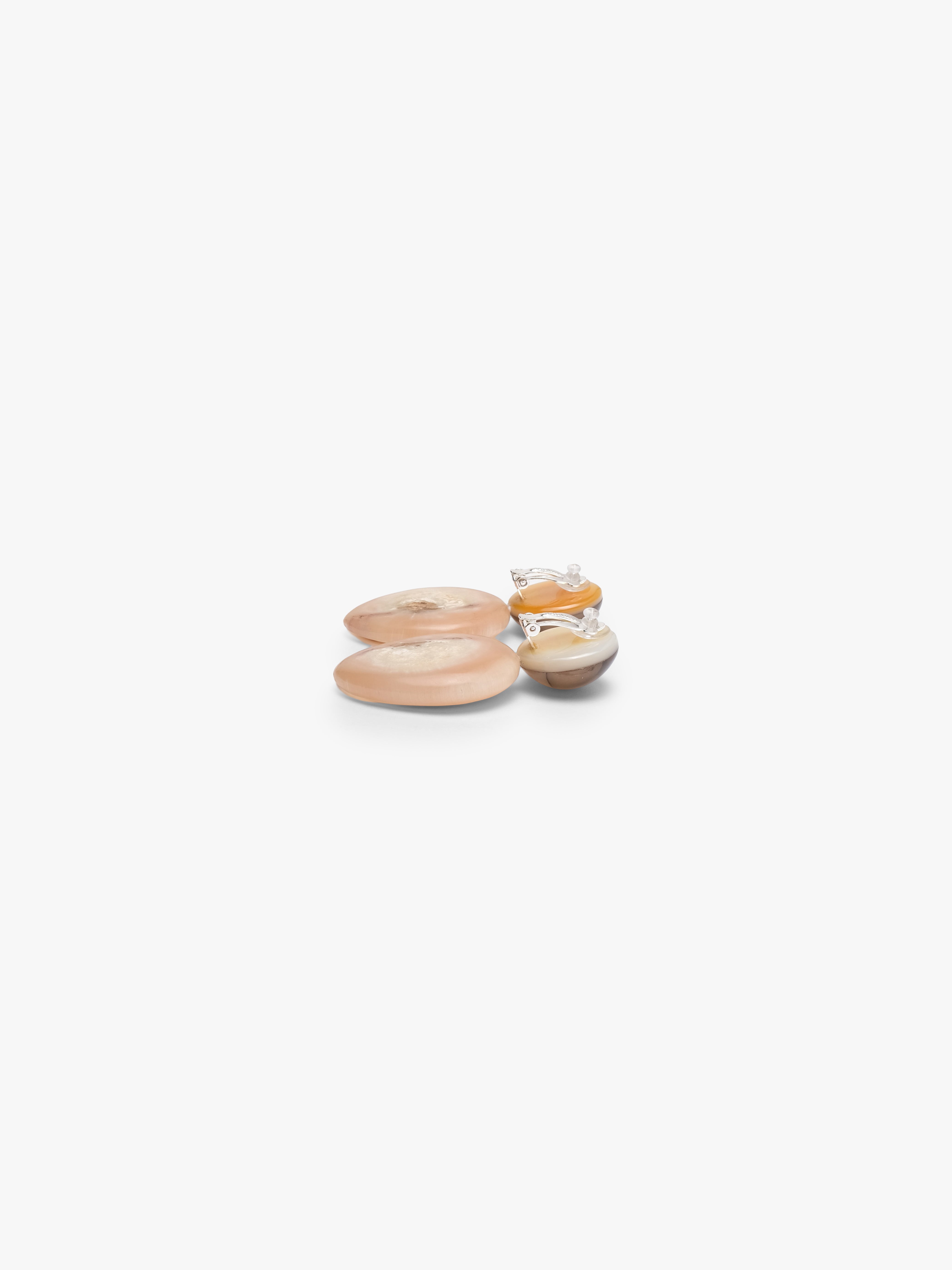 Pair of earrings with horn, citrine beads on a white background