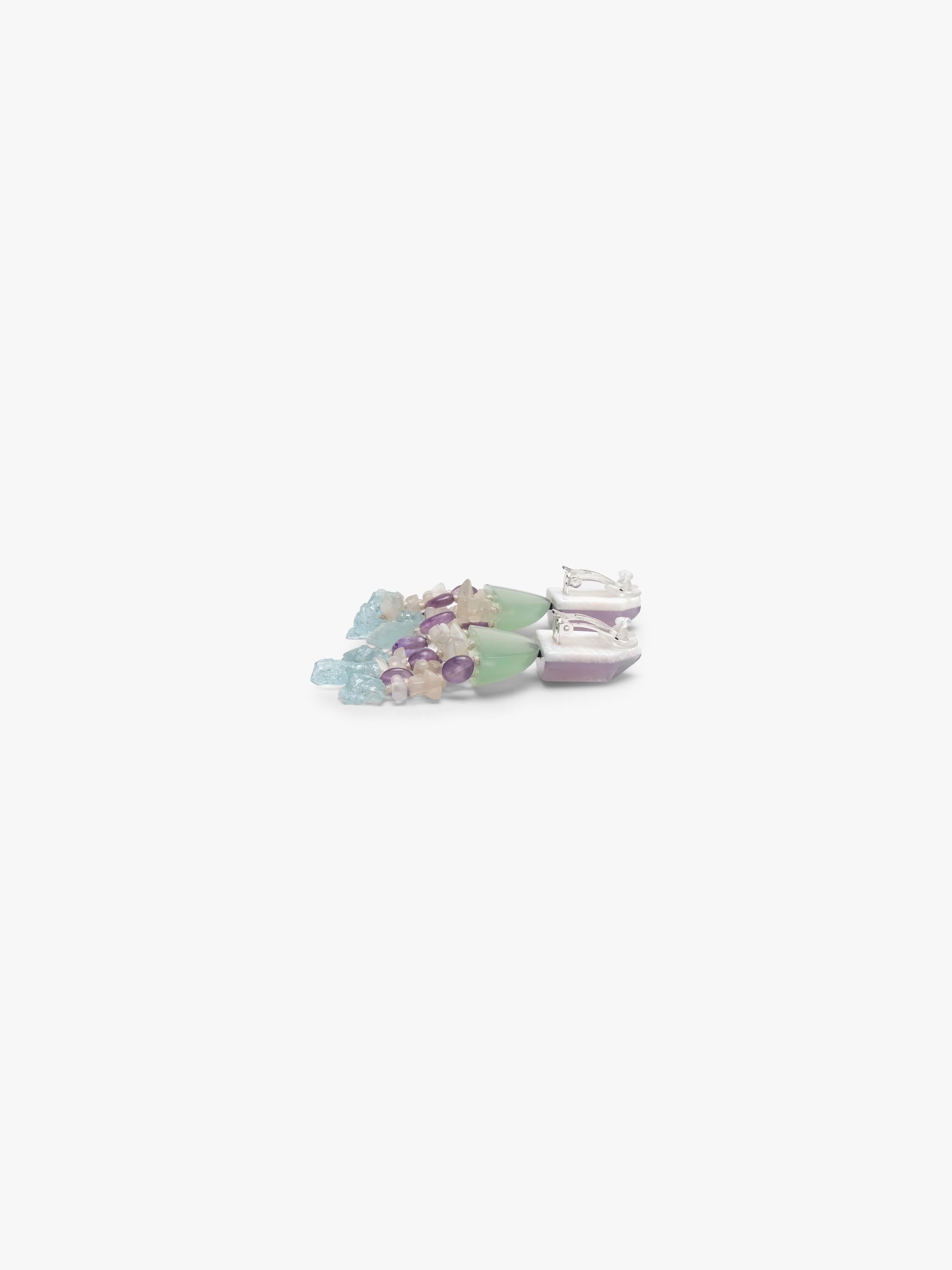Dangle earrings with a purple and green top and beige, purple and blue tassles underneath. Displayed on a white background. 
