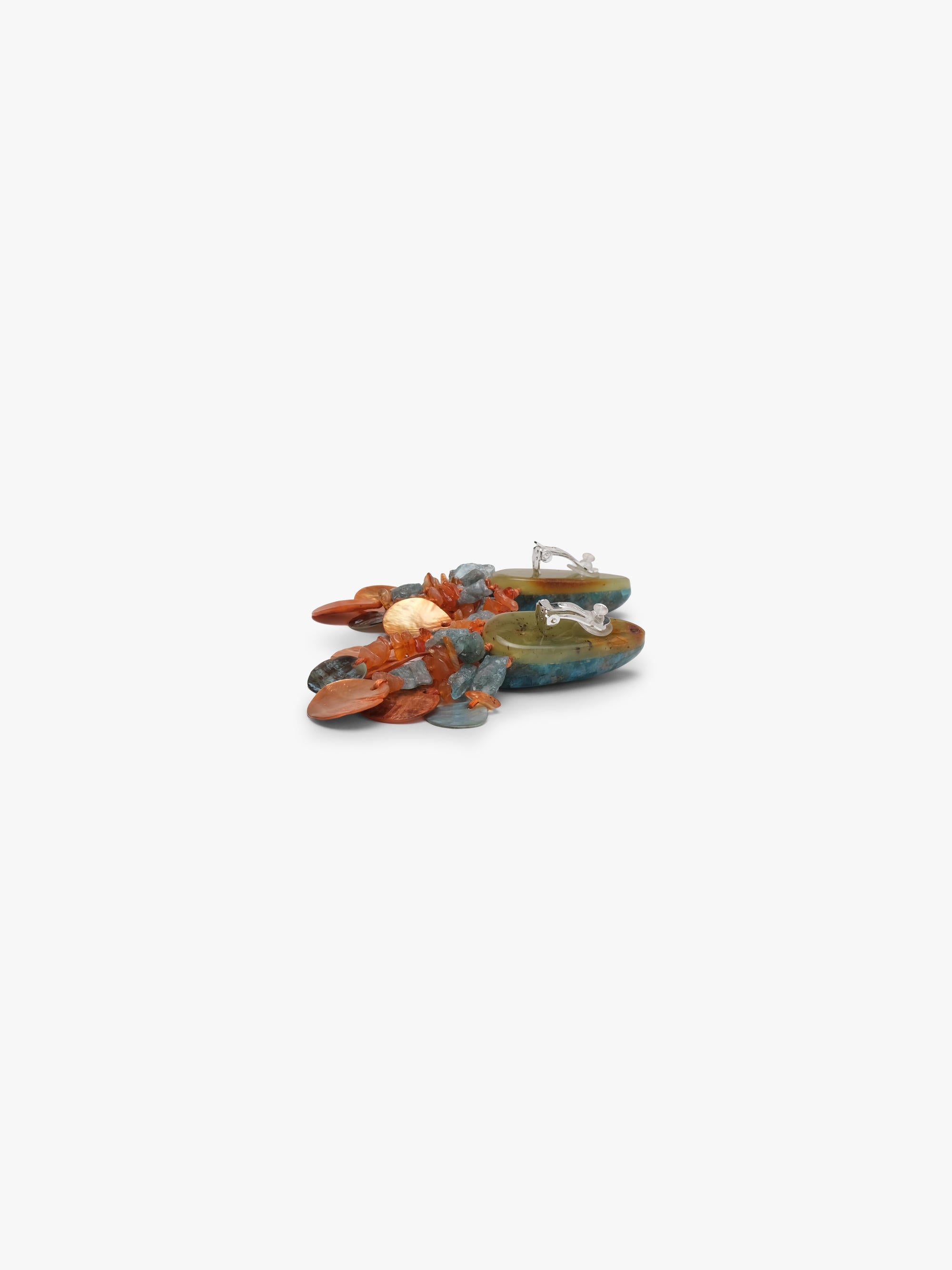 A pair of statement dangle earrings featuring elongated dark blue-green stone tops and clusters of faceted round beads in copper, bronze, and iridescent tones, set against a plain light gray background.