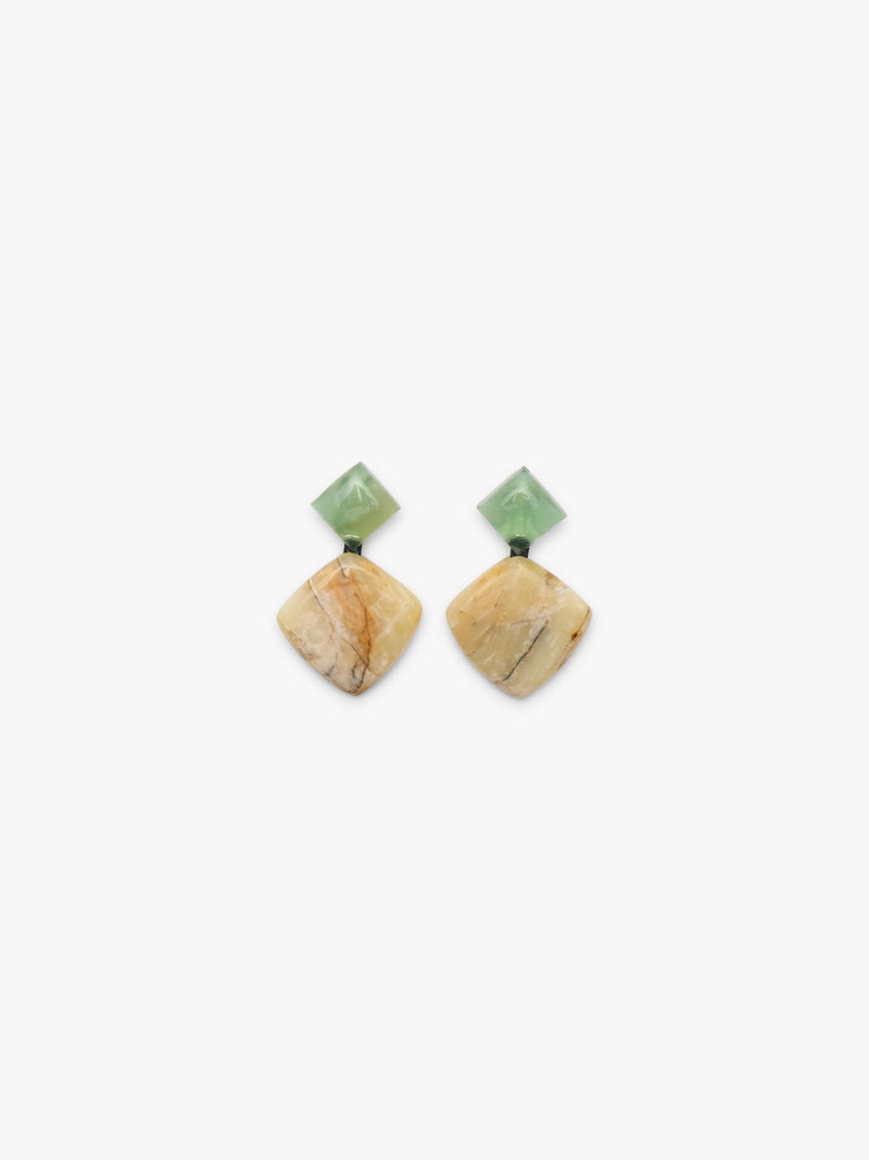 A pair of handmade dangle earrings featuring light green faceted gemstone studs and irregular, organic-shaped beige and brown stone drops, displayed on a clean white background.