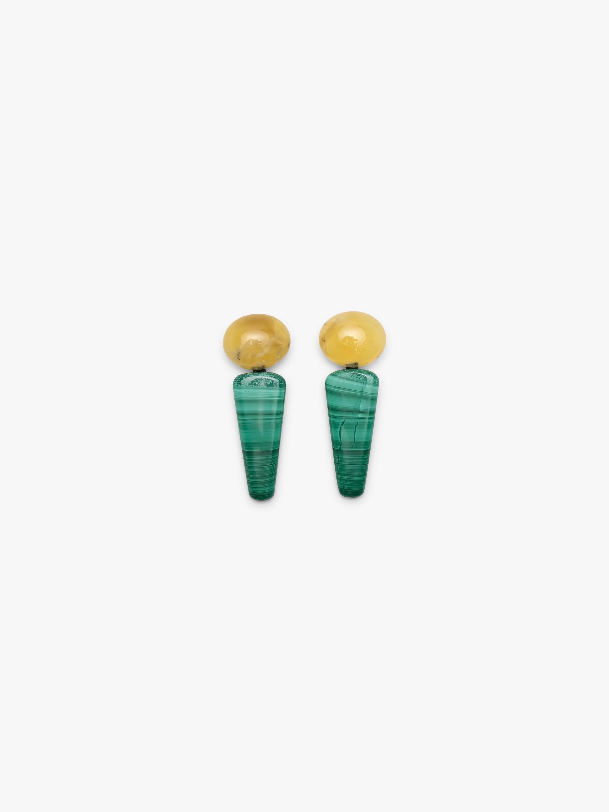Long, chunky turquoise and yellow drop earrings against a solid white background