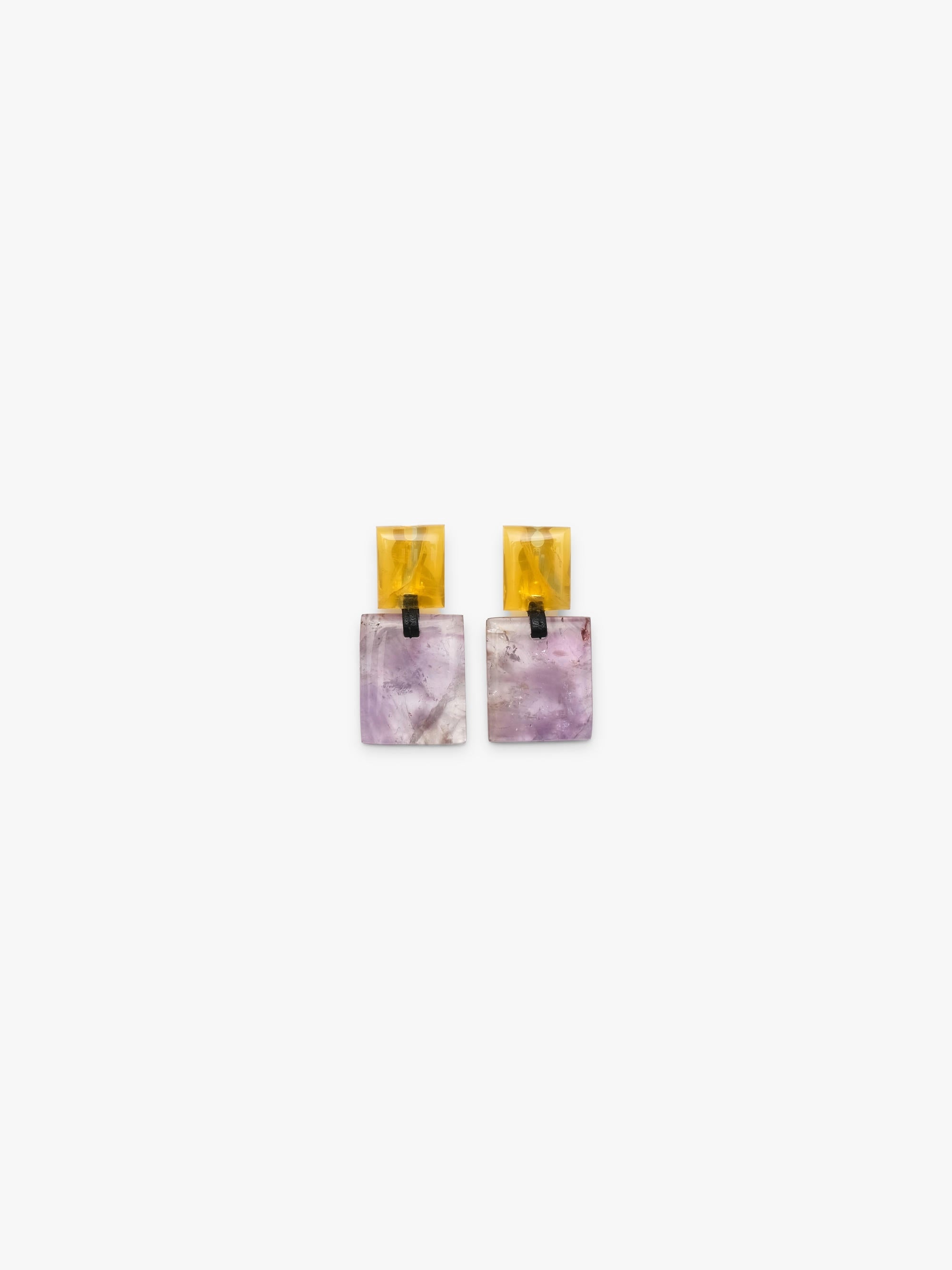 Earrings made of a small yellow square and a larger purple square underneath, displayed on a white background.